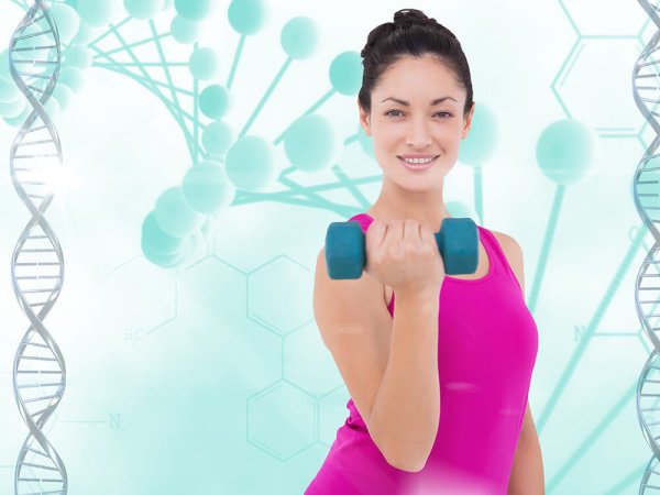Digital composite of Healthy woman lifting dumbbell against DNA structure